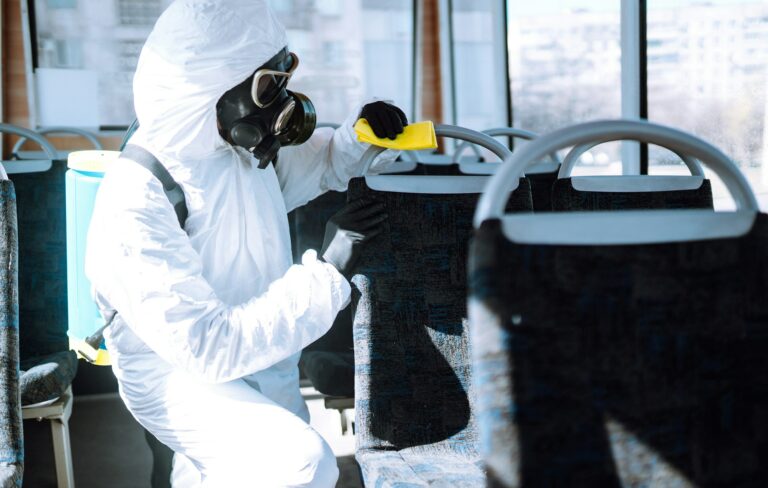 cleaning-and-disinfection-transport-man-in-protective-suit-washing-disinfection-public-transport-.jpg